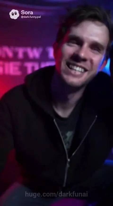 Two men in a futuristic lab with purple and blue lights working on a glowing spherical device labeled 'SUBSPACE BRIDGE'.