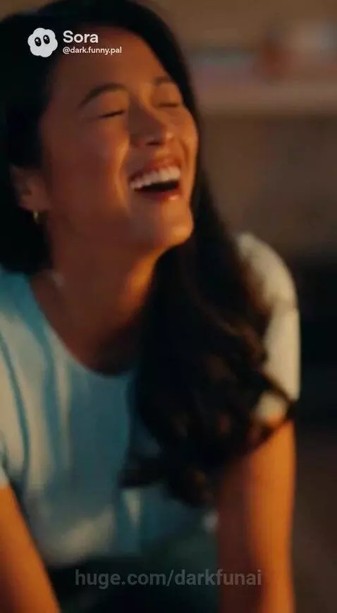 Couple laughing at a desk, discussing a "lucky girl" named Erin Brog met at Orlando Beach.