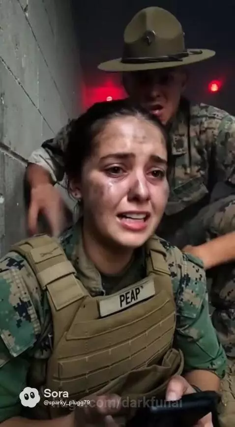 Distressed recruit in camouflage crying in a dark, smoky bunker while a drill sergeant yells at her.