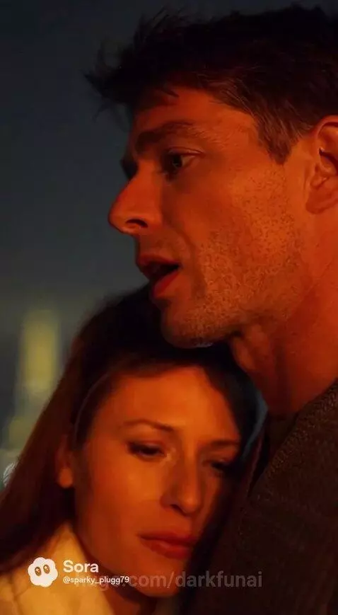 Couple on a balcony overlooking the Eiffel Tower at night, discussing a disturbing discovery.