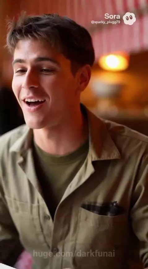 Couple enjoying an American breakfast at a Parisian cafe with a red and white checkered tablecloth.