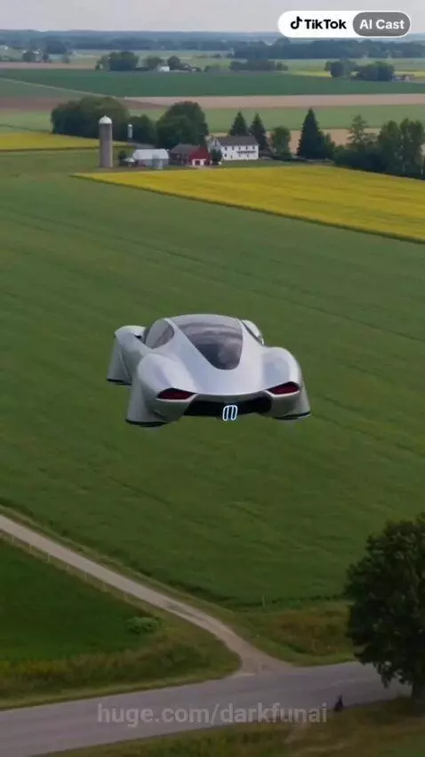 Sleek silver futuristic flying car hovering over lush green fields next to a highway.