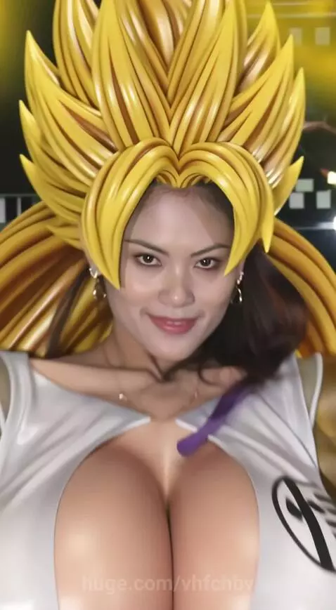 Animated female character with spiky yellow hair, large breasts, and muscular physique, surrounded by yellow energy.