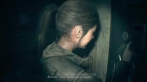 Woman in dark room illuminated by flashlight, trying to open a safe with a digital keypad.