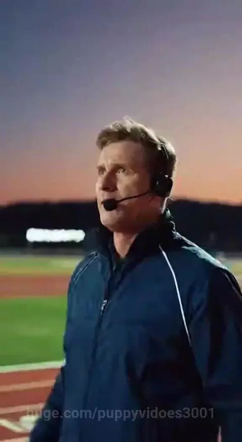 A man and an animated gorilla at the starting blocks of a running track, ready for a race.