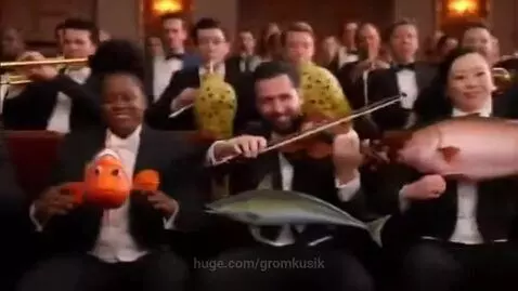 Musicians in classical attire comically playing animated fish as instruments in a concert hall.