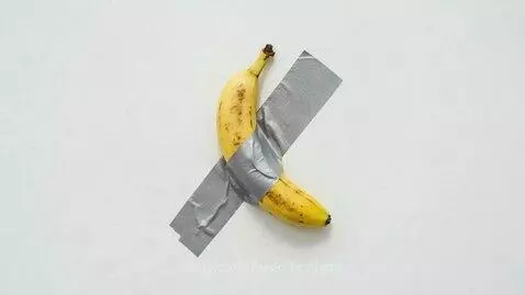 Man with Heineken bottle and banana, celebrating with a crowd, with tagline 'Enjoy both sides of life'.