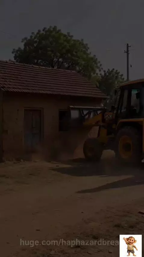 Two sad monkey children, one in a wheelchair, crying after their house is demolished by an excavator.