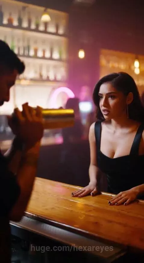 Bartender with a gun pointed at a man in a bar after a woman orders an angel shot.