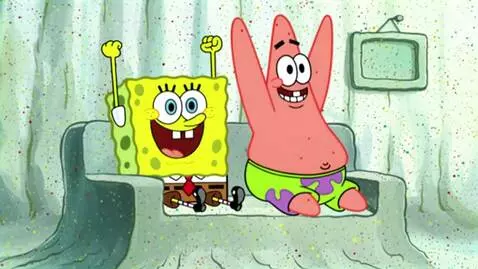 Spongebob and Patrick sitting on a couch, looking angry and shouting at each other.