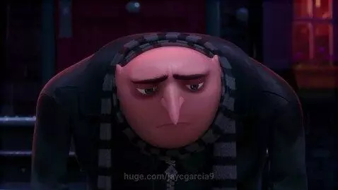 Animated character Gru looking down with a sad or thoughtful expression, reacting to a question about Krabby Patties.