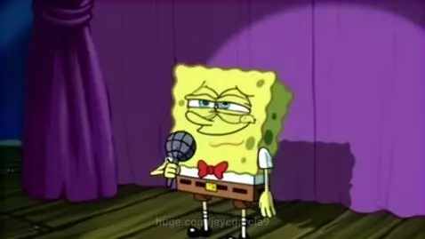Spongebob Squarepants on stage with microphone, looking overjoyed after being ungrounded.