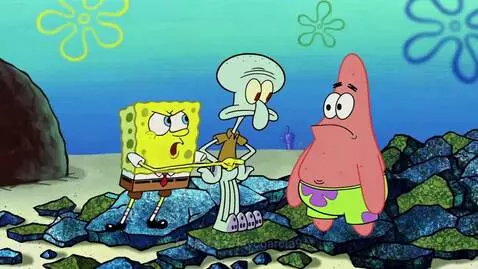 Spongebob looking upset and pointing at Patrick, with Squidward looking surprised.