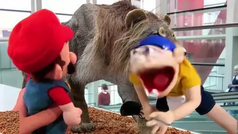 Puppet characters Mario and Jeffy in front of a realistic lion statue, with Mario scolding Jeffy.