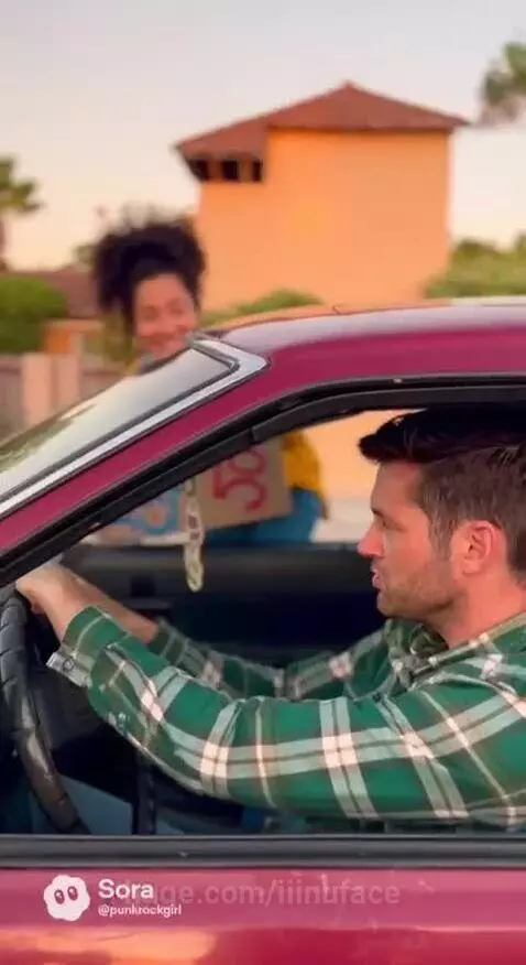 Woman in yellow cardigan and blue overalls holding 'FREE RIDE' sign at sunset, negotiating with man in red car.