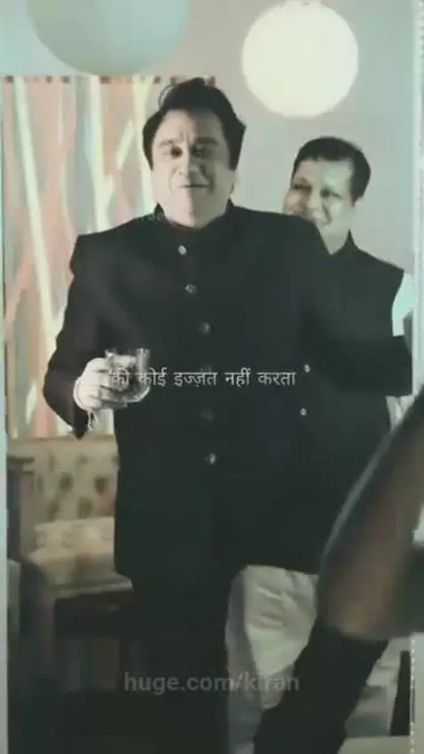 Man in a suit holding a glass, speaking about money and respect.