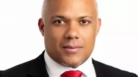 Man's face morphing through different ethnicities and skin tones, representing global diversity.