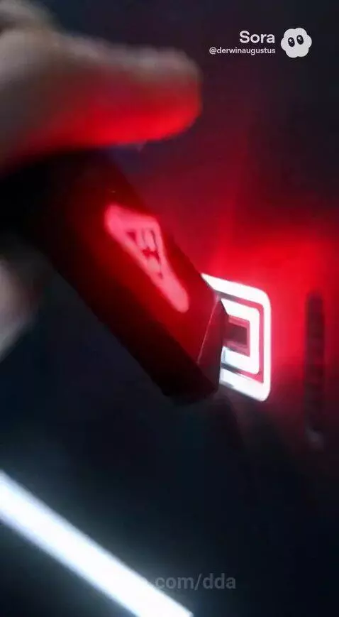 Anime girl with headphones running from a building explosion after a self-destruct sequence.