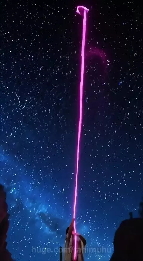 Cowboy in a desert at night, holding a lasso, with a glowing star caught on a cactus.