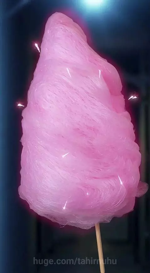 Vampire holding a large pink cotton candy after a ghost transformed into it.