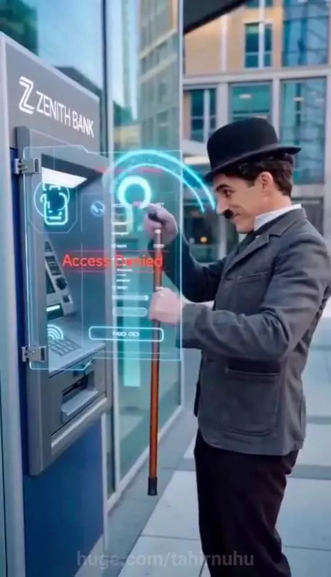 Man dressed as Charlie Chaplin taps a holographic ATM with his cane, causing money to pour out.