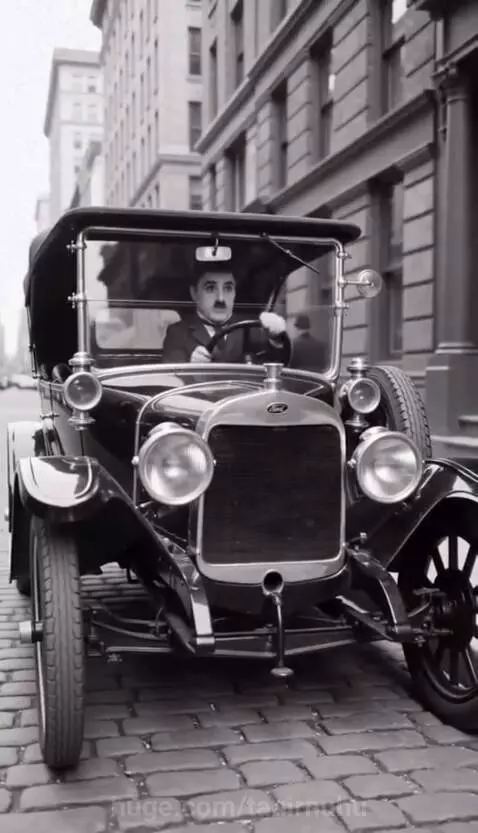Charlie Chaplin in a vintage car that has sprouted wings and is flying over a city.