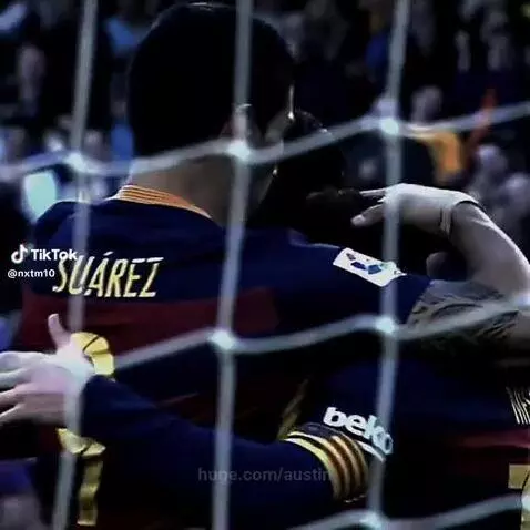 FC Barcelona's Messi, Suárez, and Neymar (MSN) celebrating a goal together on the field.