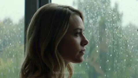 Woman in a translucent dress walking on cracking ice during a storm, symbolizing emotional turmoil.