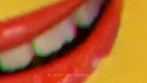 Close-up of a yellow, cardboard-like face with realistic eyes and mouth chewing barbecue chips.