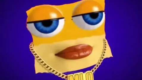 Animated yellow cardboard face with blue eyes and red lips, wearing a gold 'MIO' chain, revealing itself after taking off sunglasses.