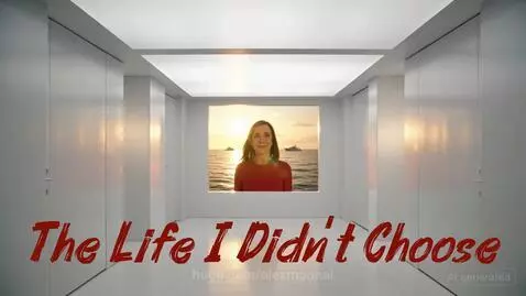 Woman in red dress looking at photos in a white gallery, with a sunset ocean background.