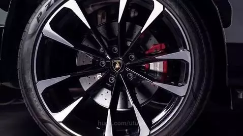 Grey Lamborghini Urus S super SUV exterior and interior details, including wheels and dashboard.