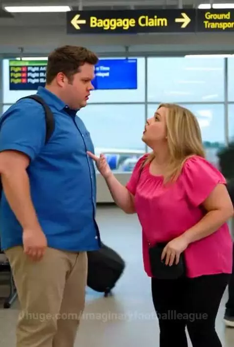 Man in blue shirt and backpack arguing with a woman in a pink top at an airport, with a flight board in the background.