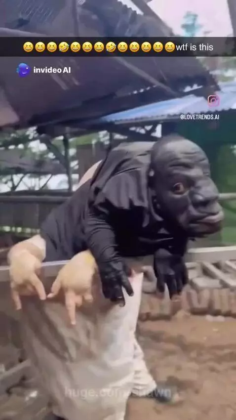 Person in a grotesque black creature mask with a pink tongue, making guttural sounds.