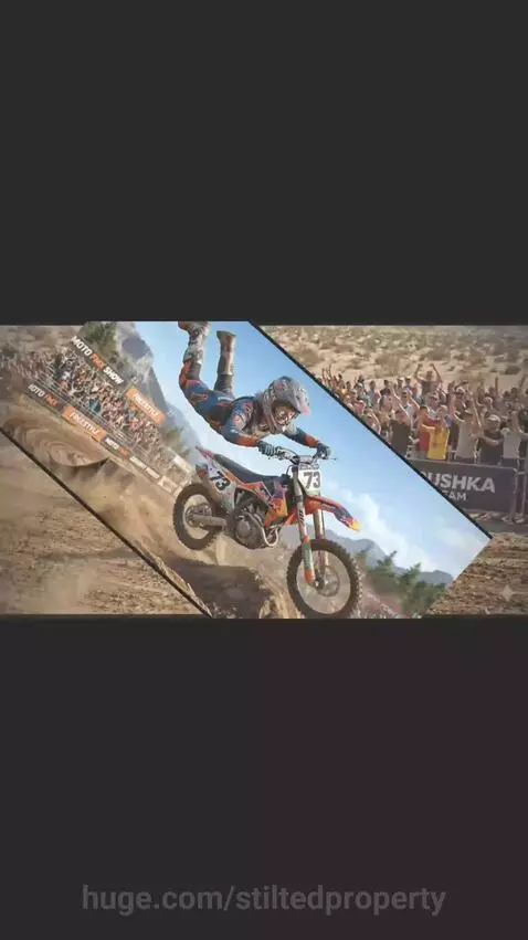Motocross rider performing a high jump with a crowd watching in the background.