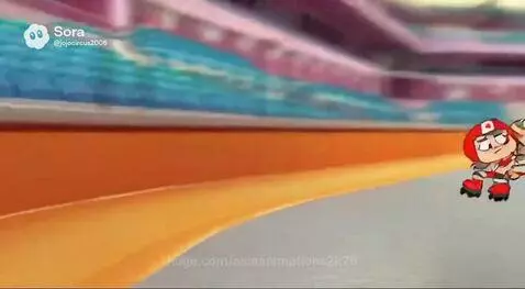 Martha Nicholas celebrating winning a roller skating race as confetti falls.