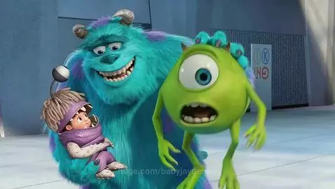Monsters Inc. Sulley smiling and holding Boo, with Mike Wazowski looking surprised holding a microphone.