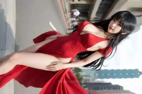 Animated Asian woman with long black hair in a flowing red dress with high slits, posing on a city street.