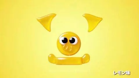 Animated Haribo cat-shaped gummies stacked to form characters on a bright yellow background.