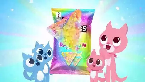 Animated cat characters excitedly looking at Doritos Sugar Rainbow chips and a soccer stadium.