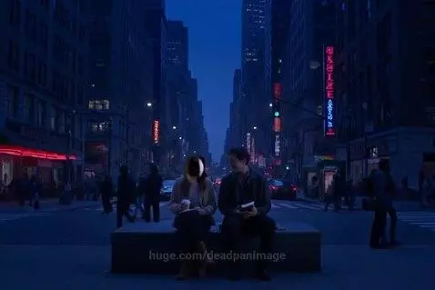 Couple sitting on a city bench at dusk, holding cups and talking, with blurred city lights and buildings in the background.