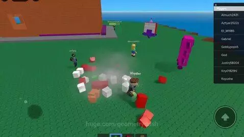 Roblox-style game landscape with a large block structure exploding into smaller pieces, YouTuber reacting in picture-in-picture.