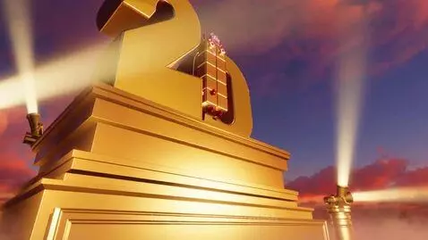 Golden '20' logo for Blockworks Studios with dramatic clouds and spotlights.