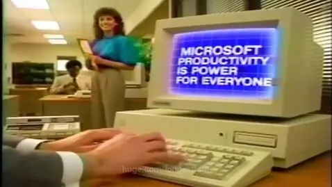 Vintage computer screen displaying Microsoft's 'The Future of Software' message with a blue grid background.