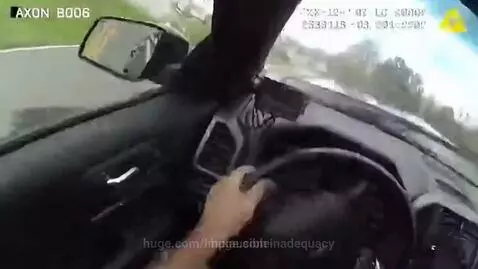 Police bodycam view of a car crash with airbags deployed after a sudden impact.